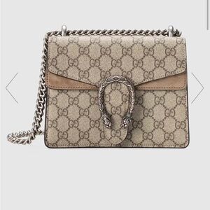 Gucci
Mini GG Supreme
Shoulder Bag